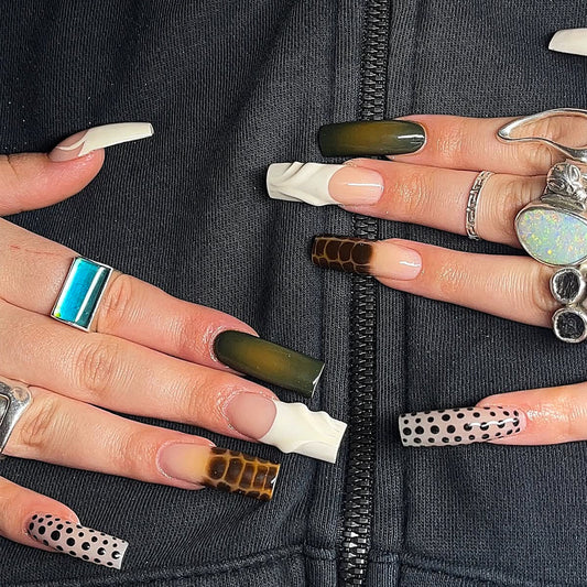 Model wearing olive green 3D long square press-on nails with mixed pattern details